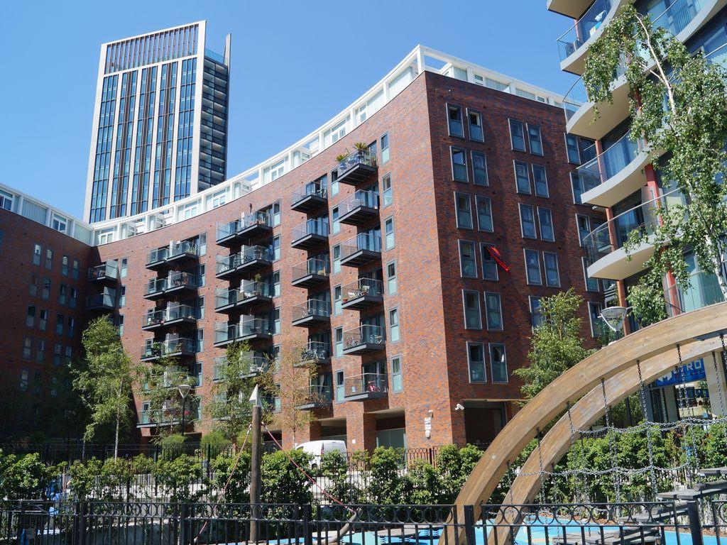 external daytime view of an apartment block